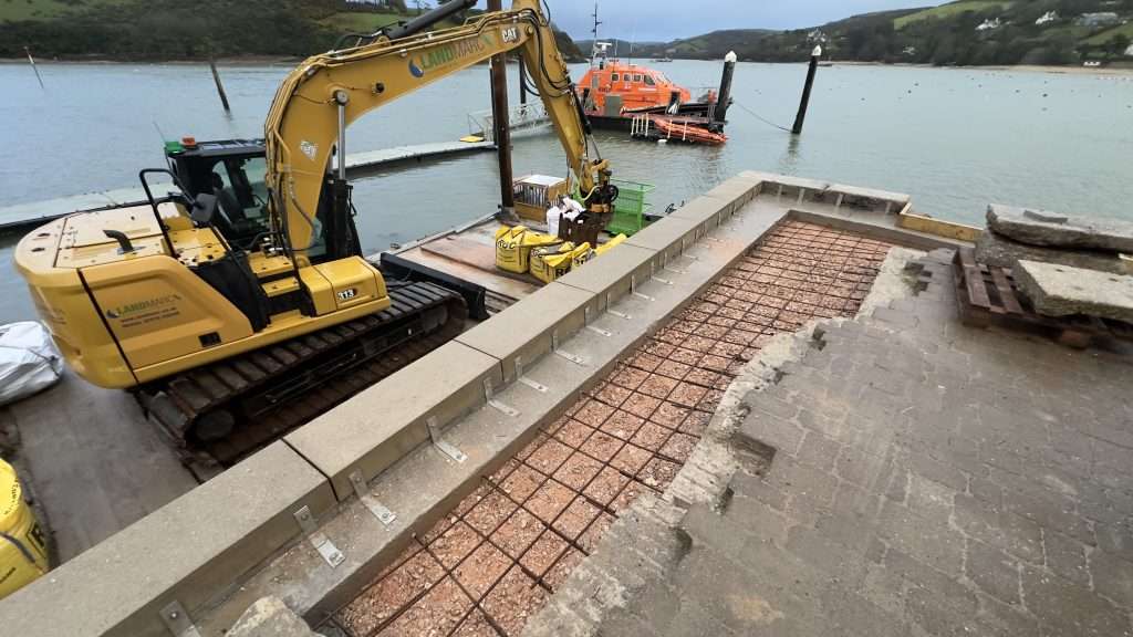 Excavator on floating barge
