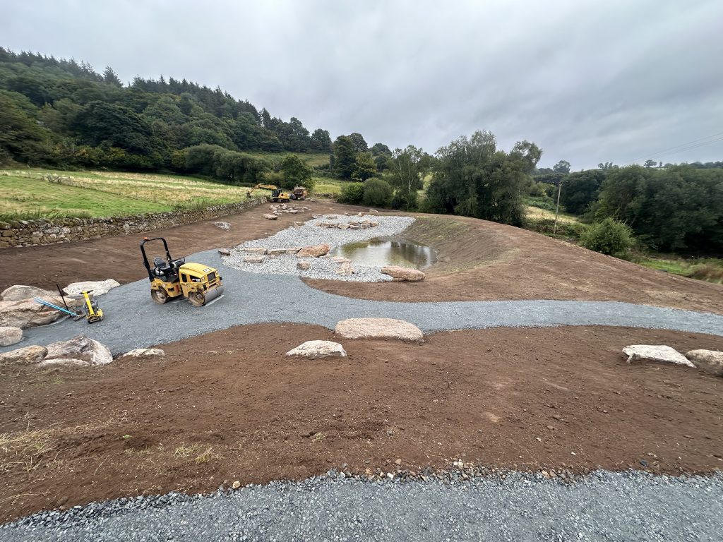 Pool backfilled and gravel laid