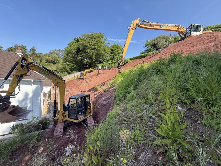 The excavators are ready for steep garden project